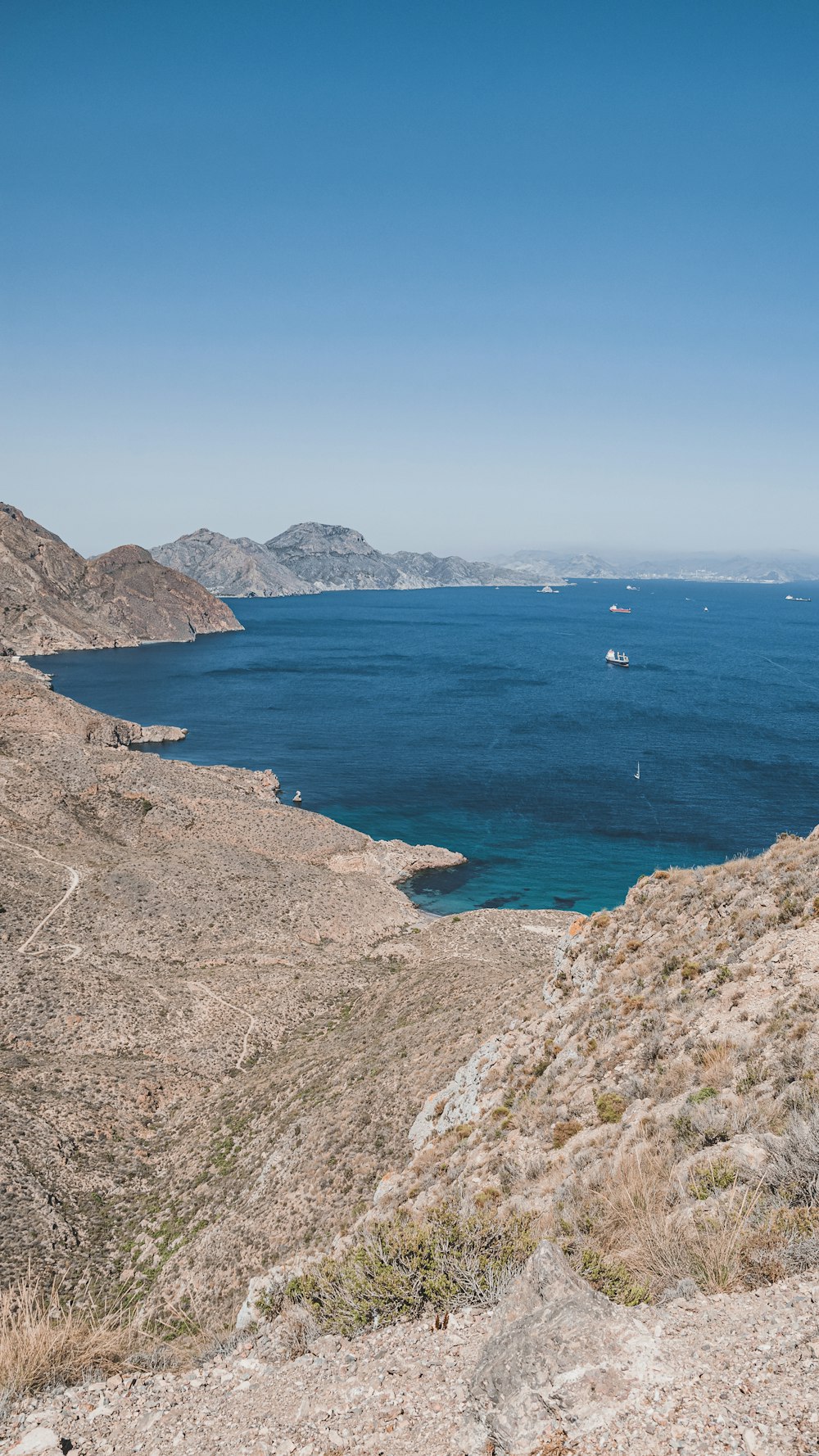 a large body of water surrounded by mountains