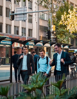 A vibrant Sydney suburb where a new metro station and highway intersect, showing bustling streets and nearby schools.