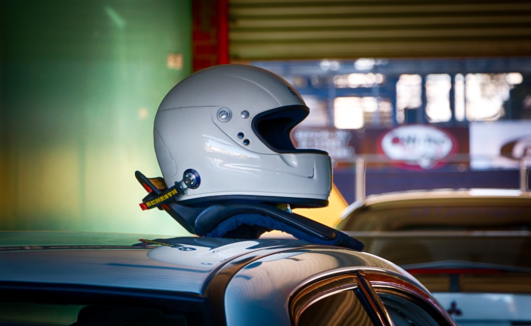 white and black motorcycle helmet