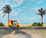 orange and black truck on road during daytime