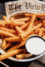 fried fries on white paper