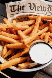 fried fries on white paper
