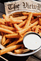 fried fries on white paper