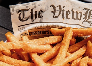 fried fries on white paper