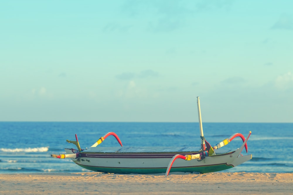 white and brown boat on sea during daytime