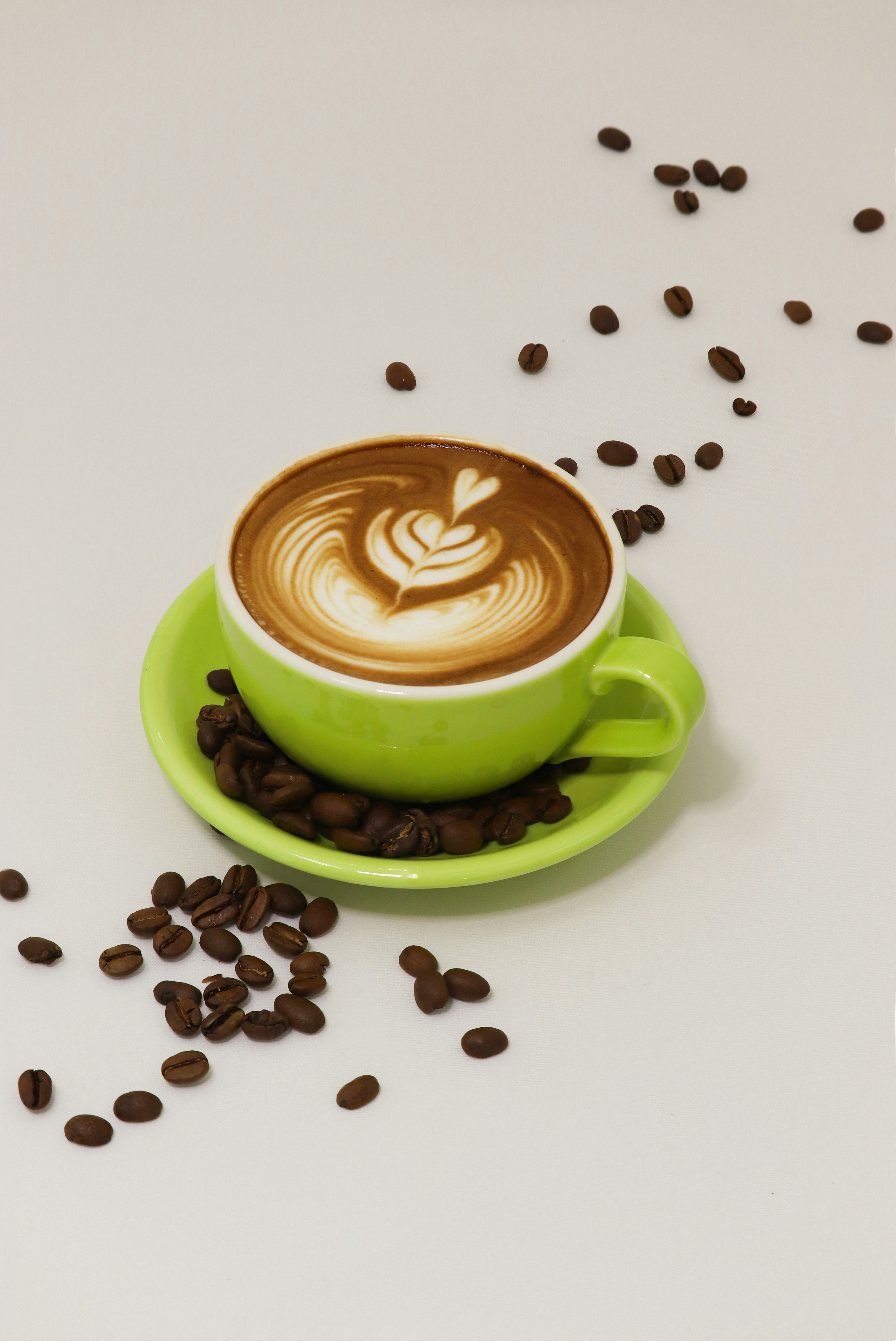Green ceramic mug with coffee photo – Free Beverage Image on Unsplash