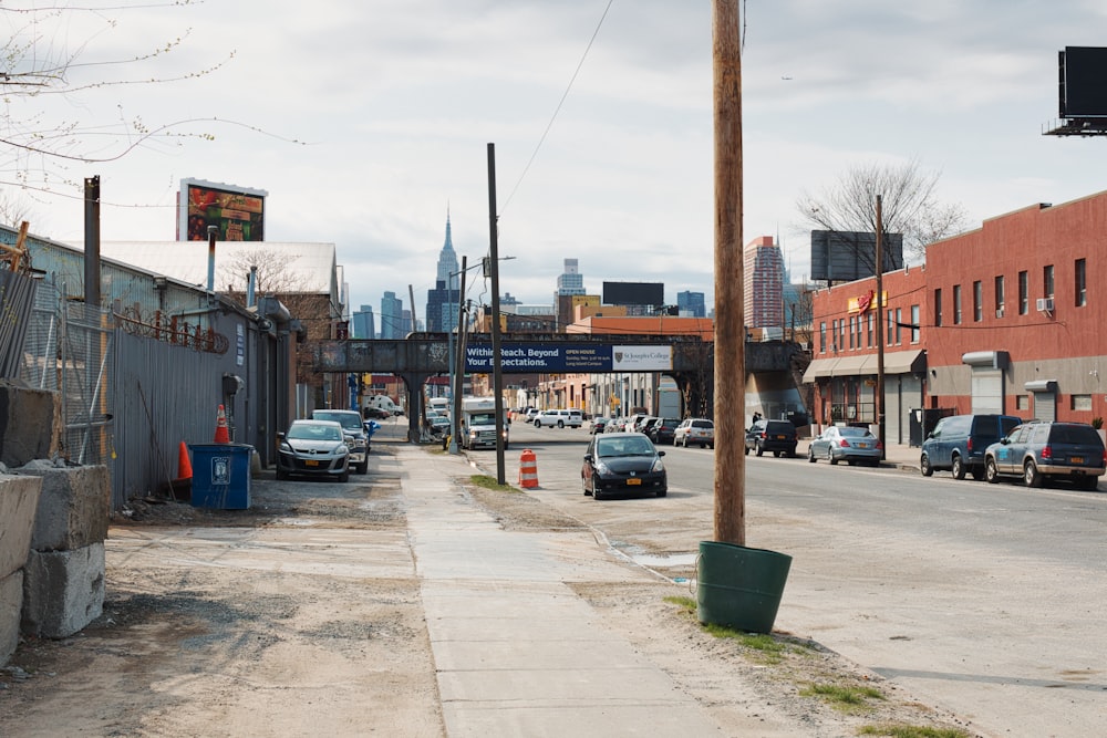 cars parked on side of the road during daytime