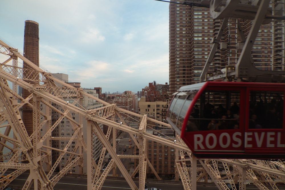 red and black train on rail tracks during daytime