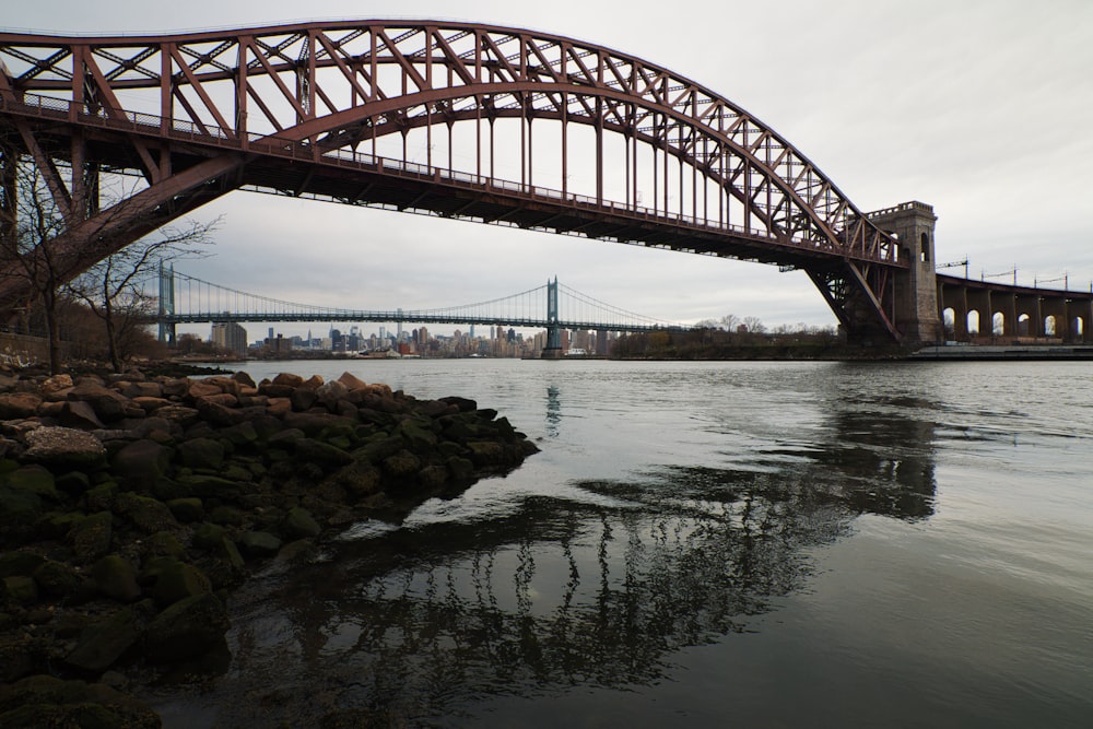 brown metal bridge over the river
