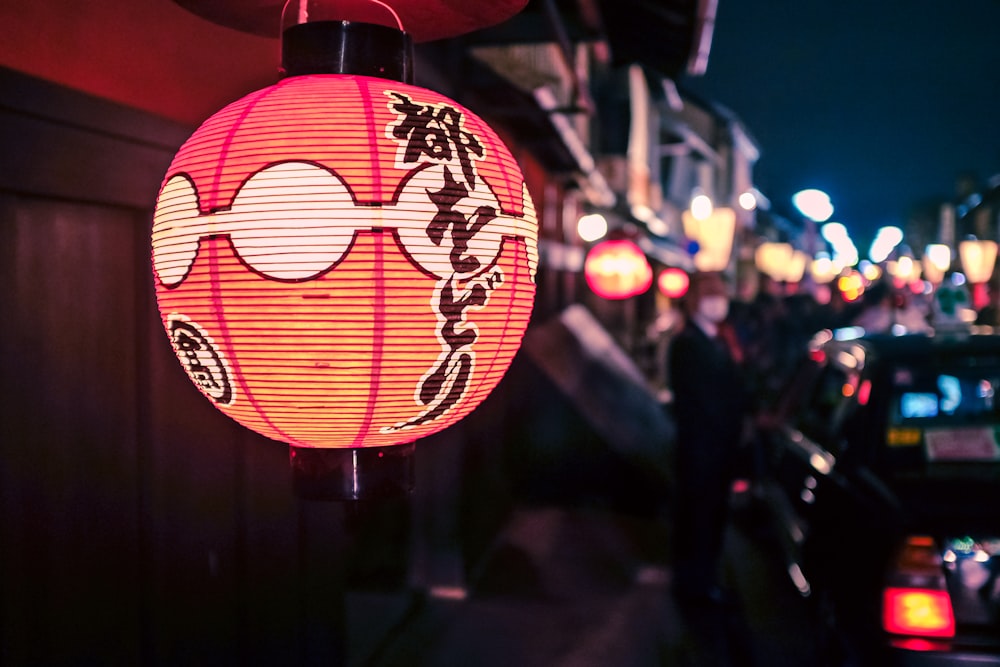 red and white lantern during night time