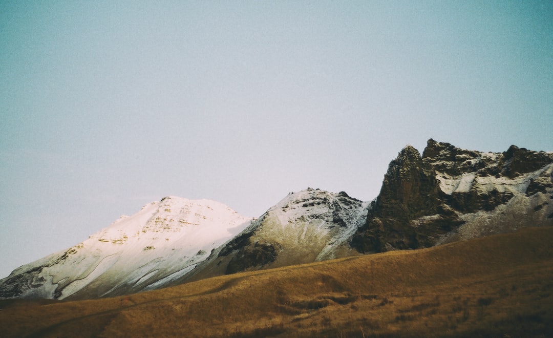 snow covered mountain during daytime