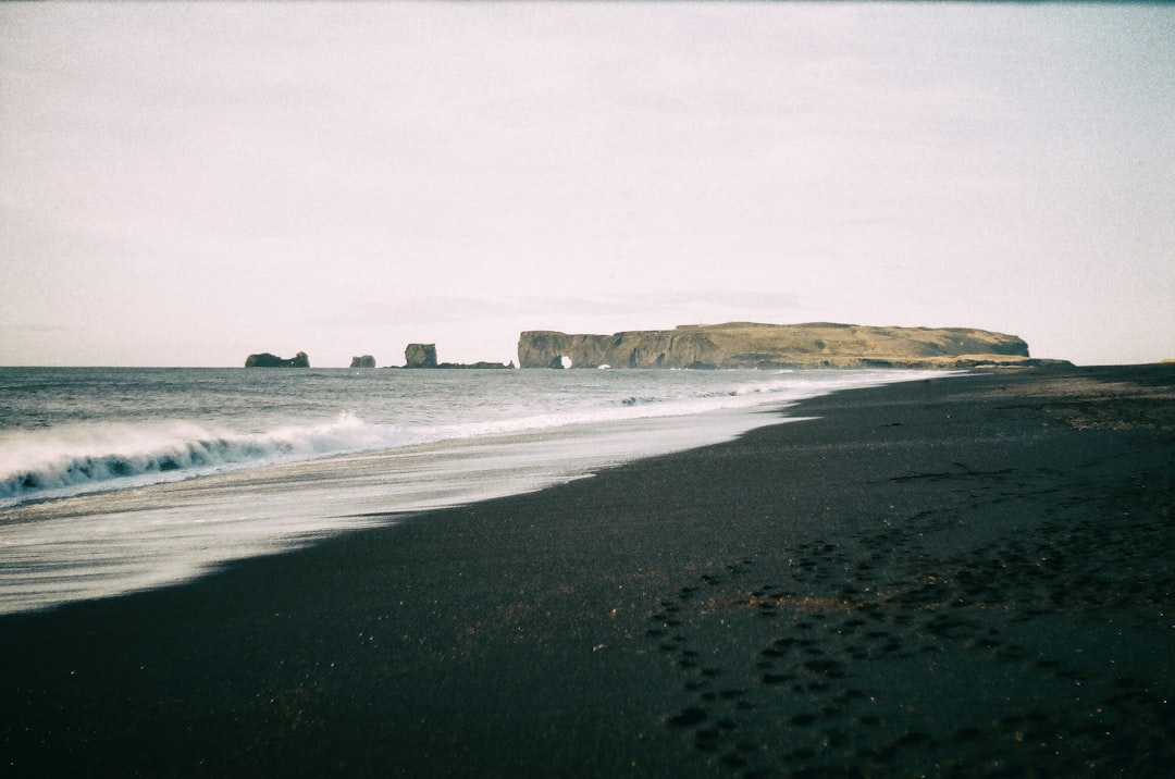 Beach photo spot Black Sand Beach Dyrhólaey Lighthouse