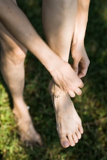 person holding hands with brown dried leaves
