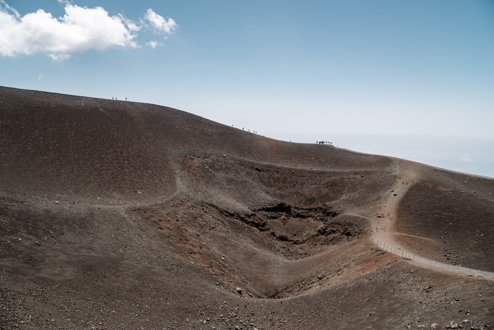 gray mountain under blue sky during daytime