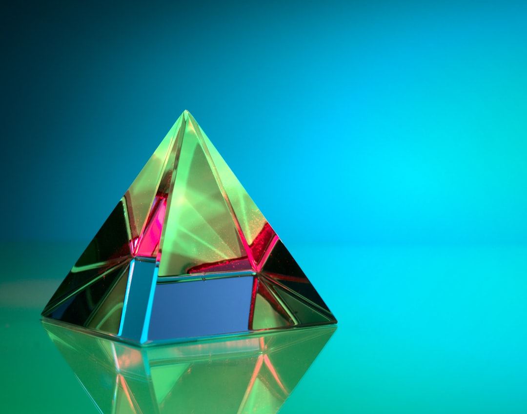 The Last Pyramid: I've had too much fun photographing this simple crystal pyramid.  I could spend days changing the colors, angles, backgrounds and more.   However, at this point it's another one of those pyramid photos.  I'll move on to other subjects...but I sure had a fun time photographing this one!