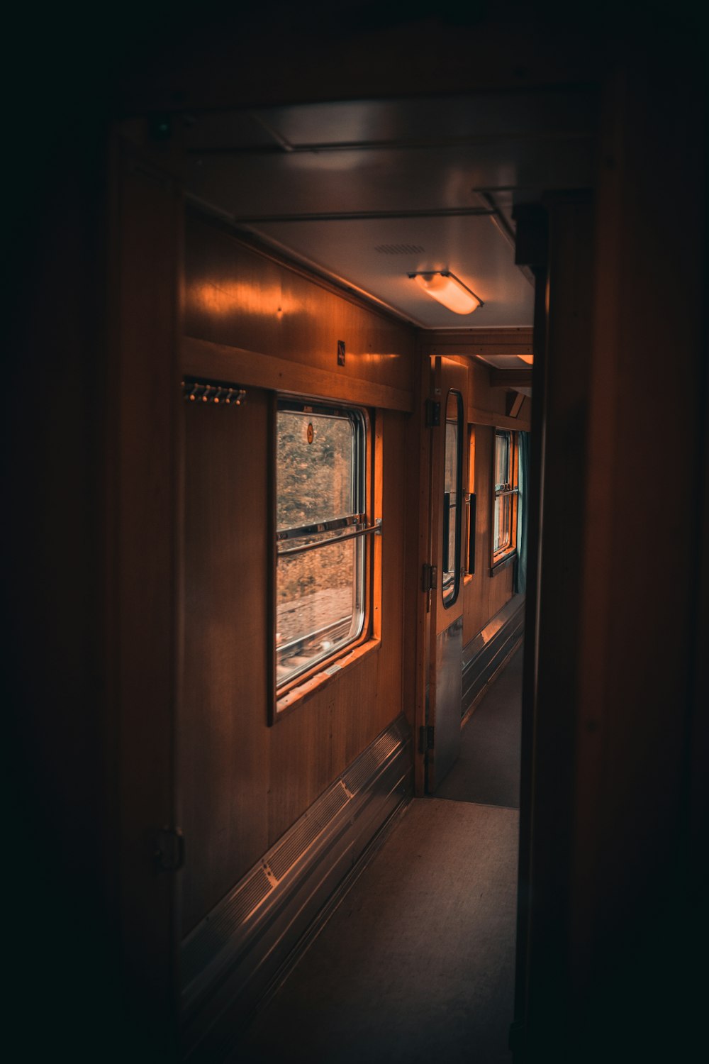 brown wooden framed glass window