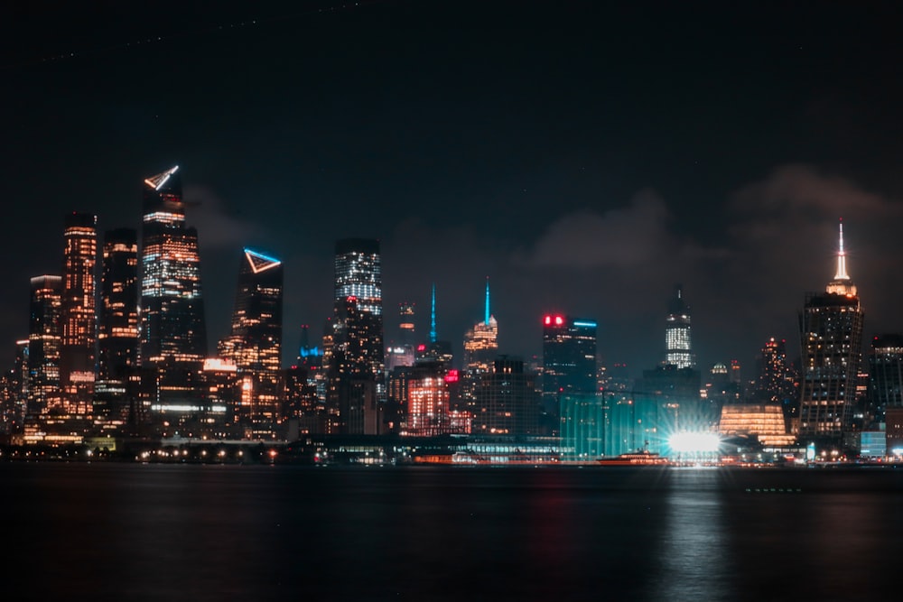 city skyline during night time