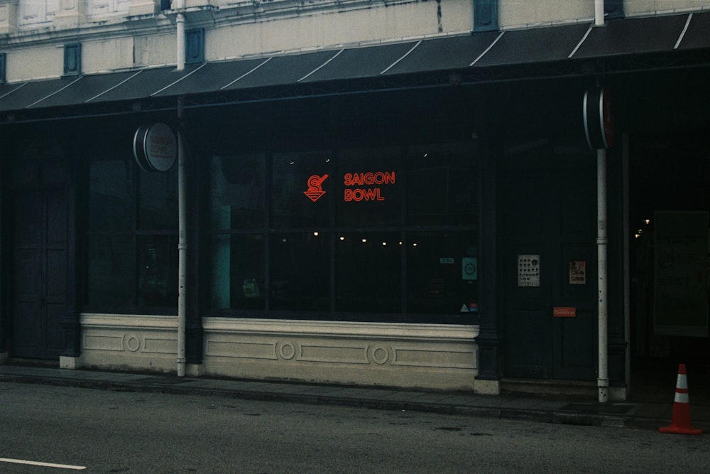 black and white store front during daytime