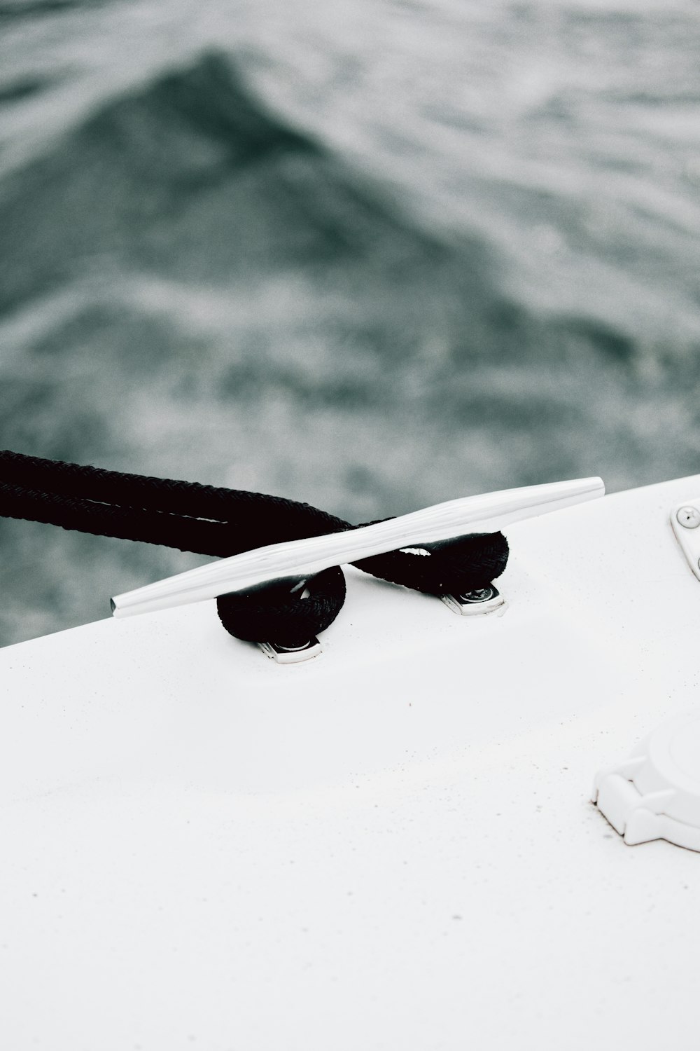 white and red framed sunglasses on white table