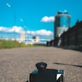 black dslr camera on black table