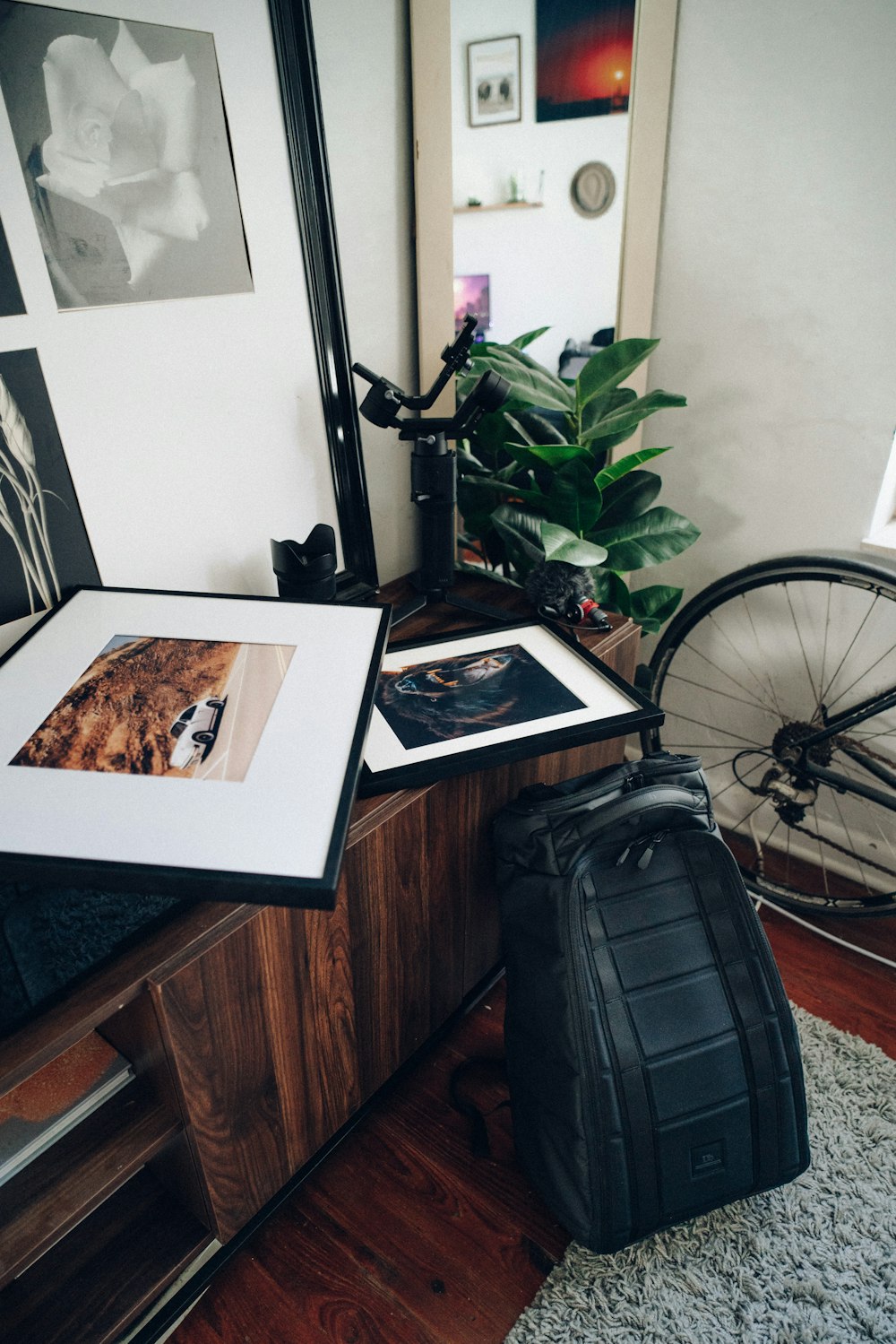 black backpack on brown wooden table