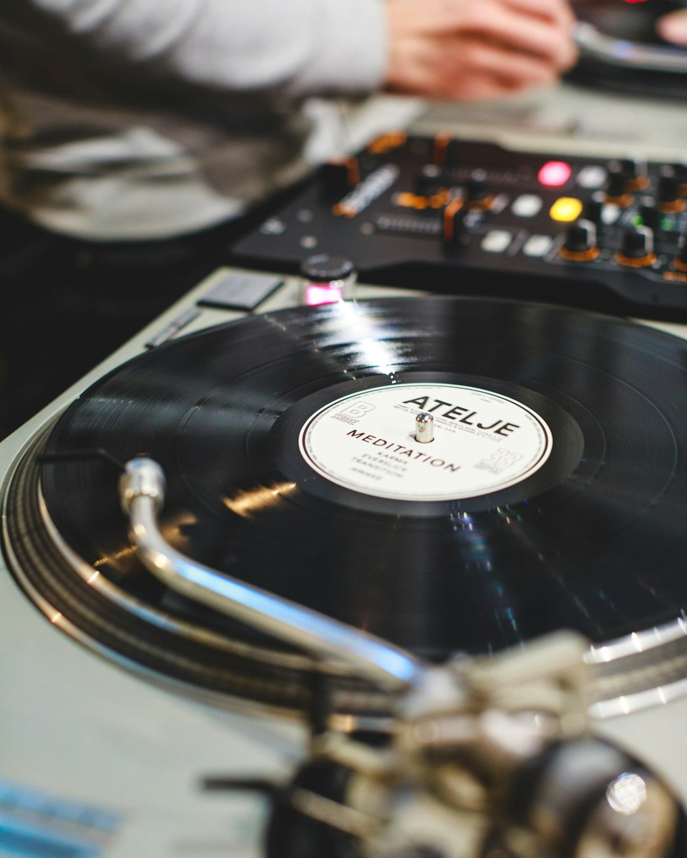 black and silver vinyl record player