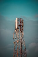 Telecommunication towers standing tall against a clear sky