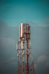 Wide view of a telecommunications tower against a clear sky