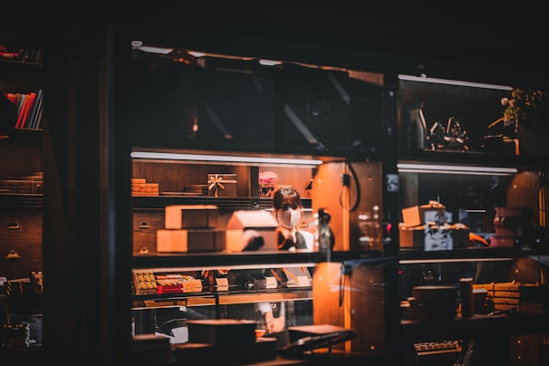 A behind-the-scenes shot of the Aurora Co team carefully preparing orders in a cozy workspace.