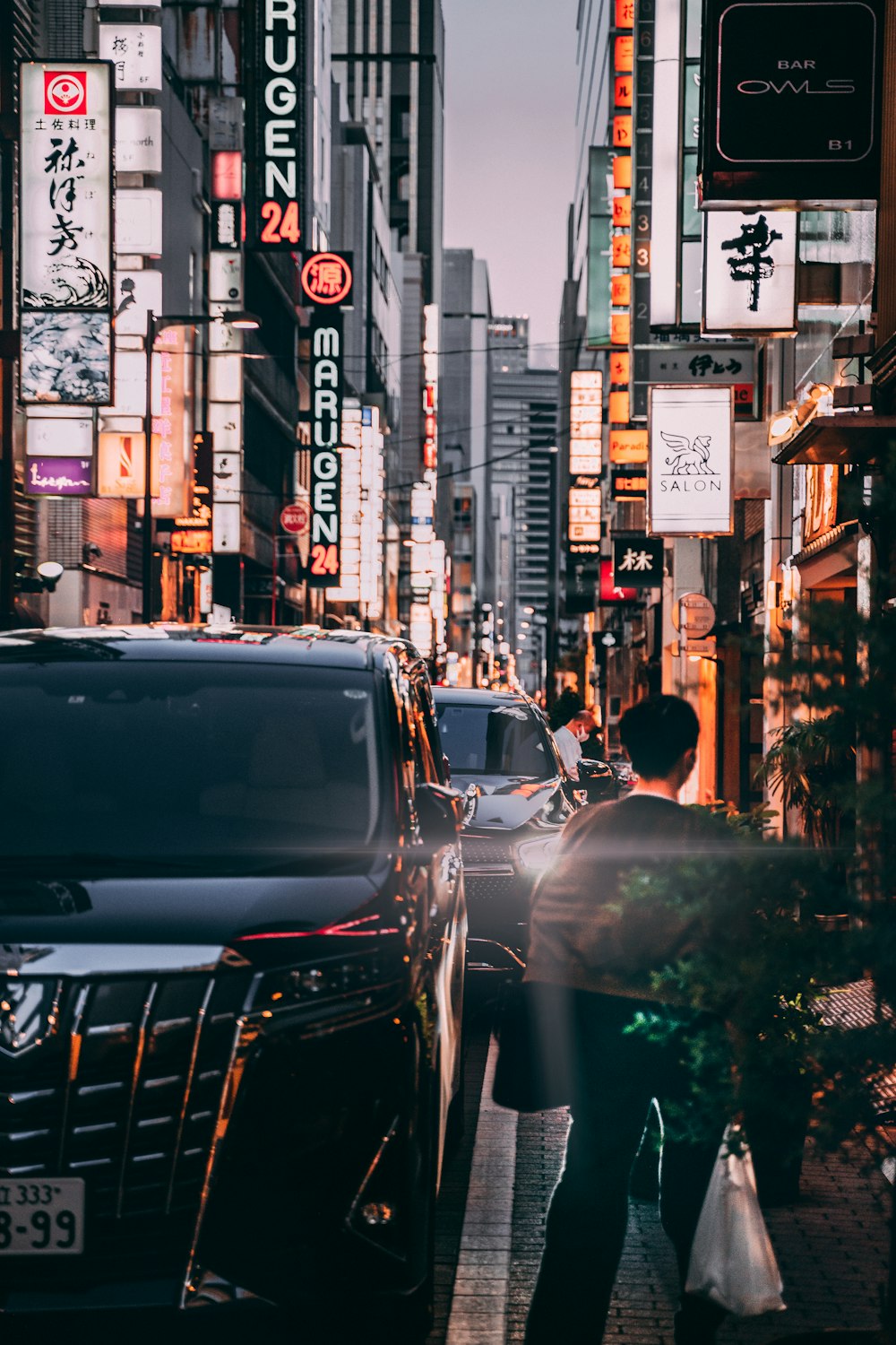 cars parked on side of the road during daytime