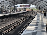 A modern train station showcasing sleek architectural design.
