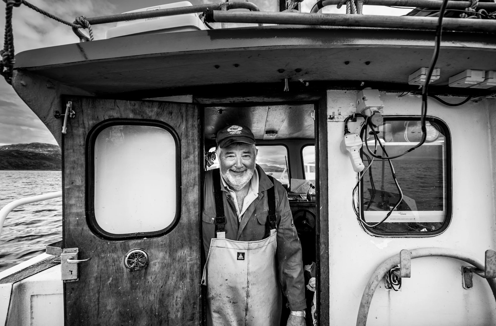 Captain and crew aboard the boat before departure