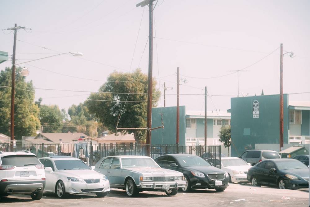 cars parked on parking lot during daytime