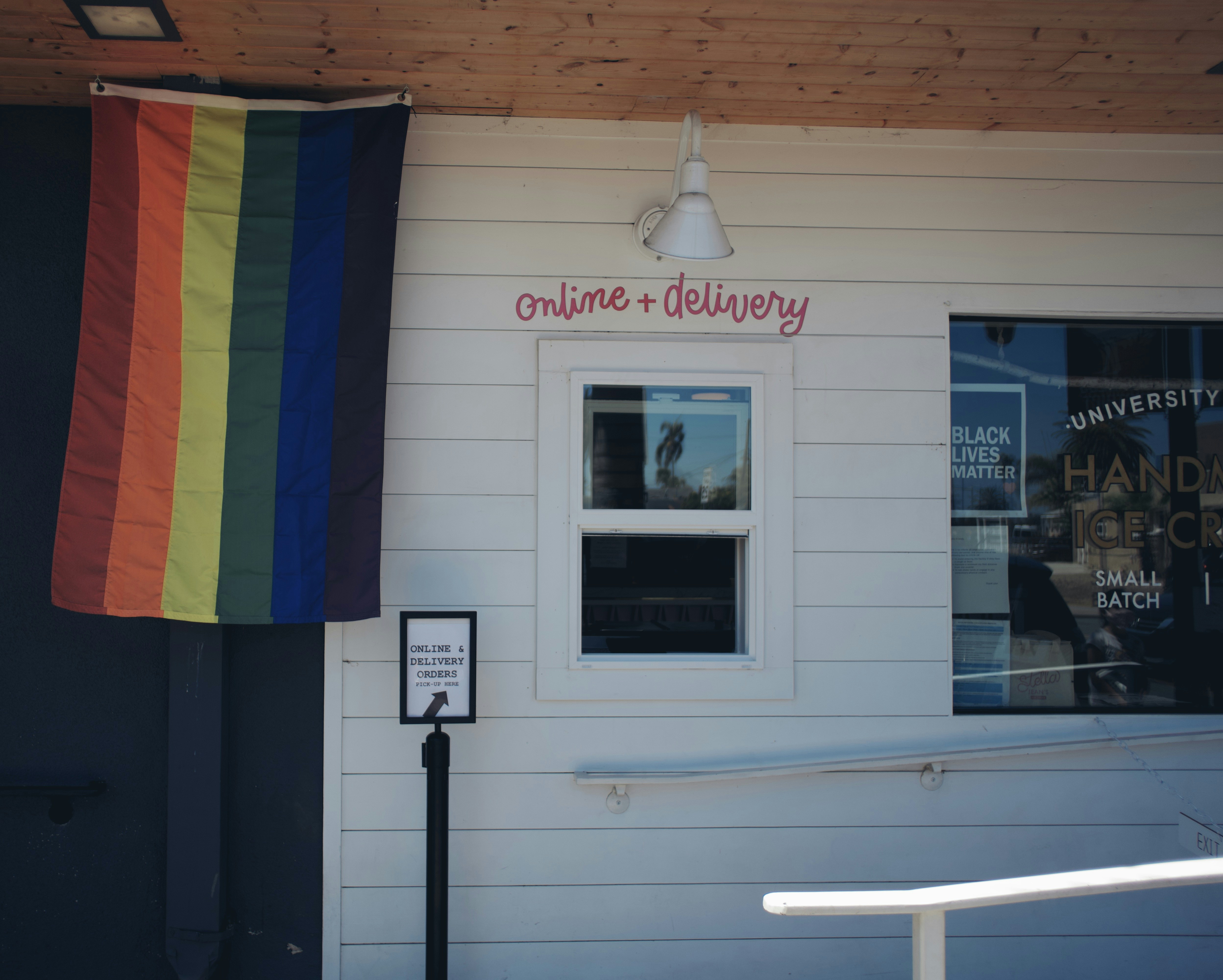 white wooden framed glass window