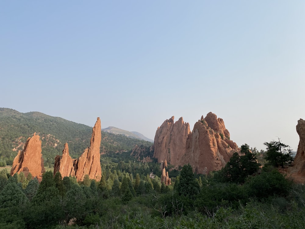 brown rock formation under blue sky during daytime