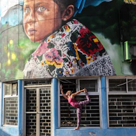 Brightly decorated yoga studio walls with playful, inspiring artwork for kids.