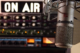 a microphone in front of a sound board