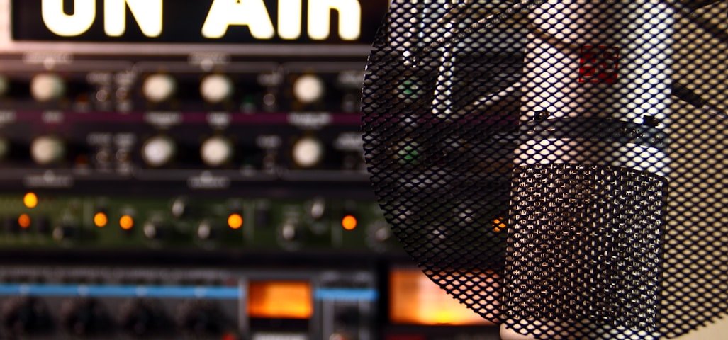 a microphone in front of a sound board