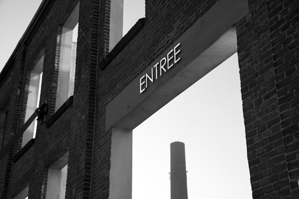 a black and white photo of the entrance to a building