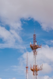 red and black tower under blue sky