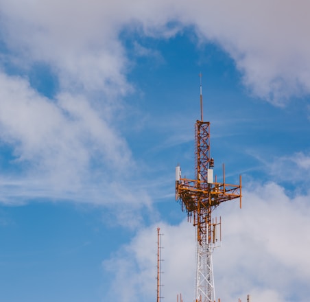 red and black tower under blue sky