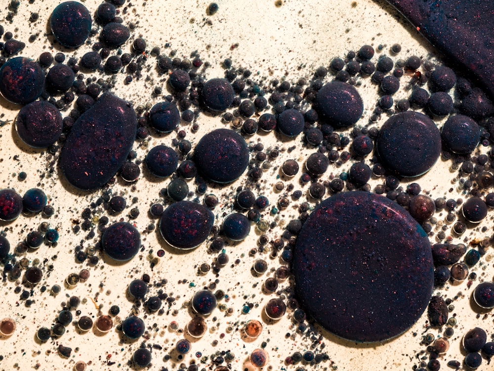 black and white stones on white sand