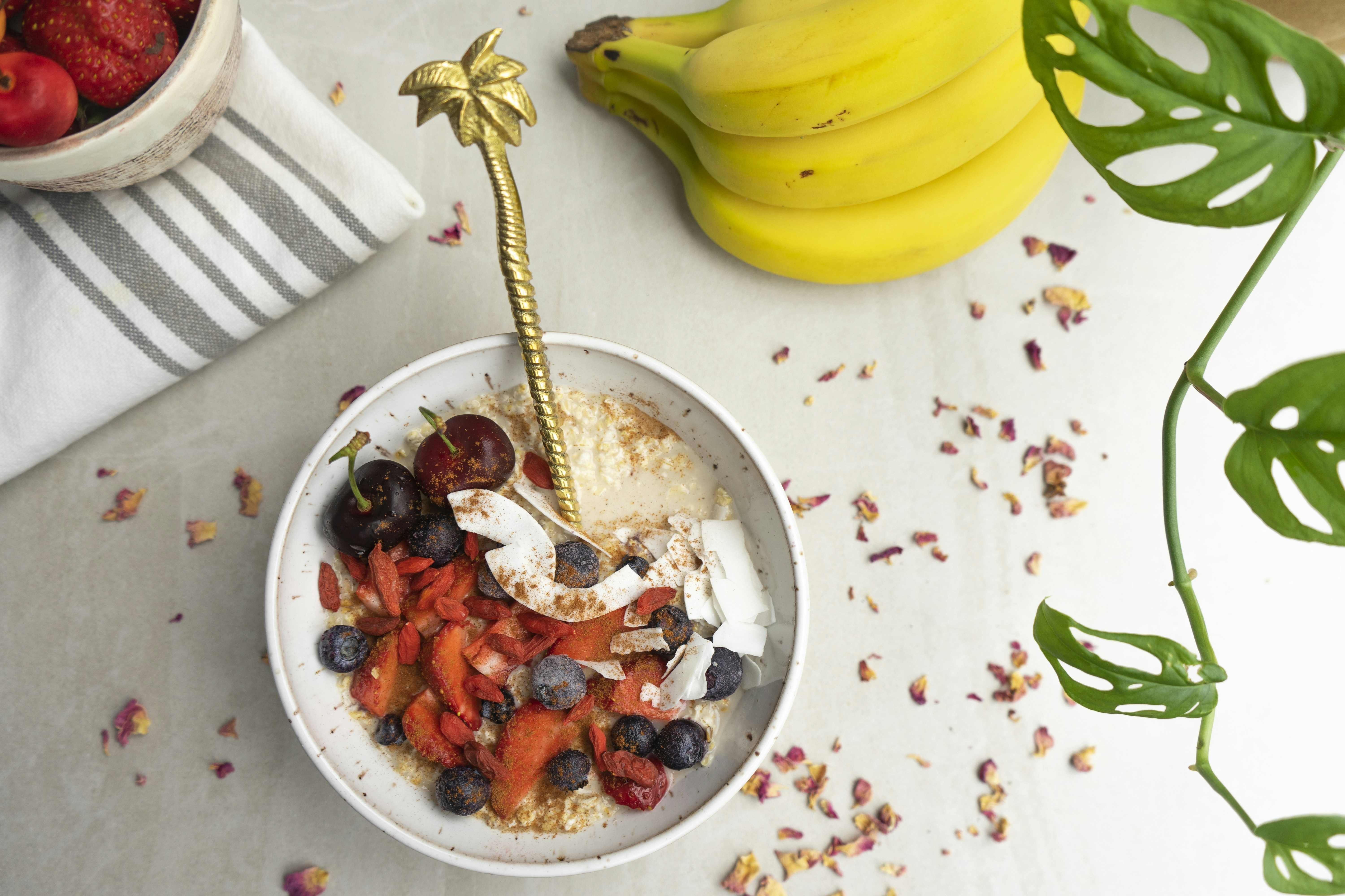 yellow banana fruit beside stainless steel fork