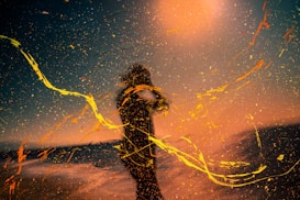 woman in black long sleeve shirt standing on snow covered ground