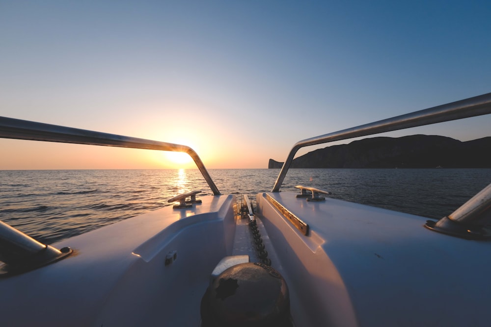 body of water during sunset