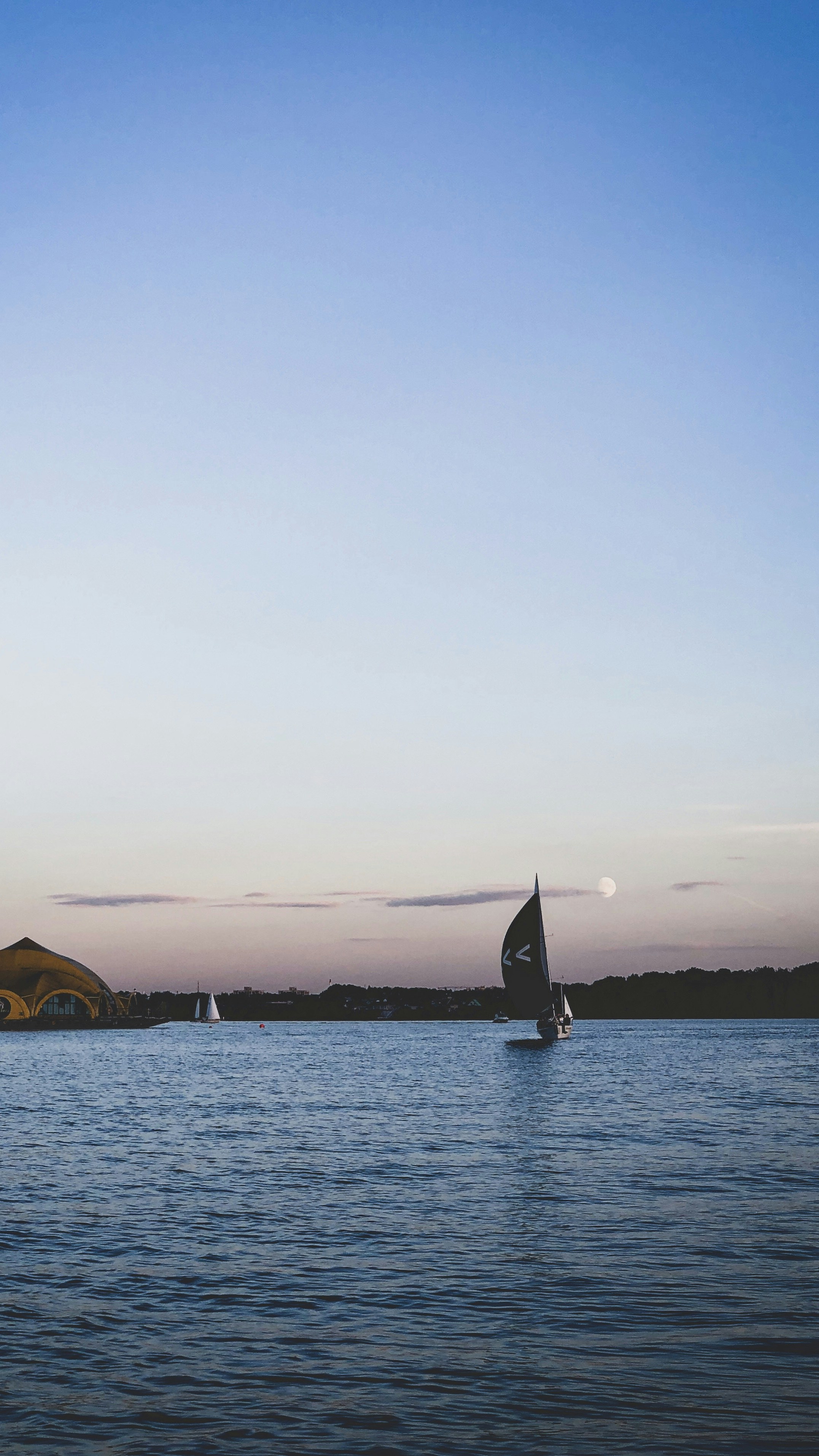 sailboat on sea during daytime