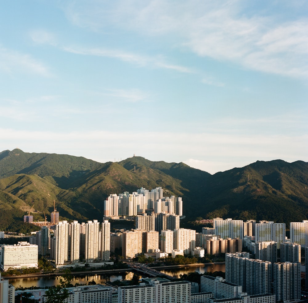 a view of a city with mountains in the background