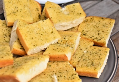 brown bread on white ceramic plate cornbread zoom background