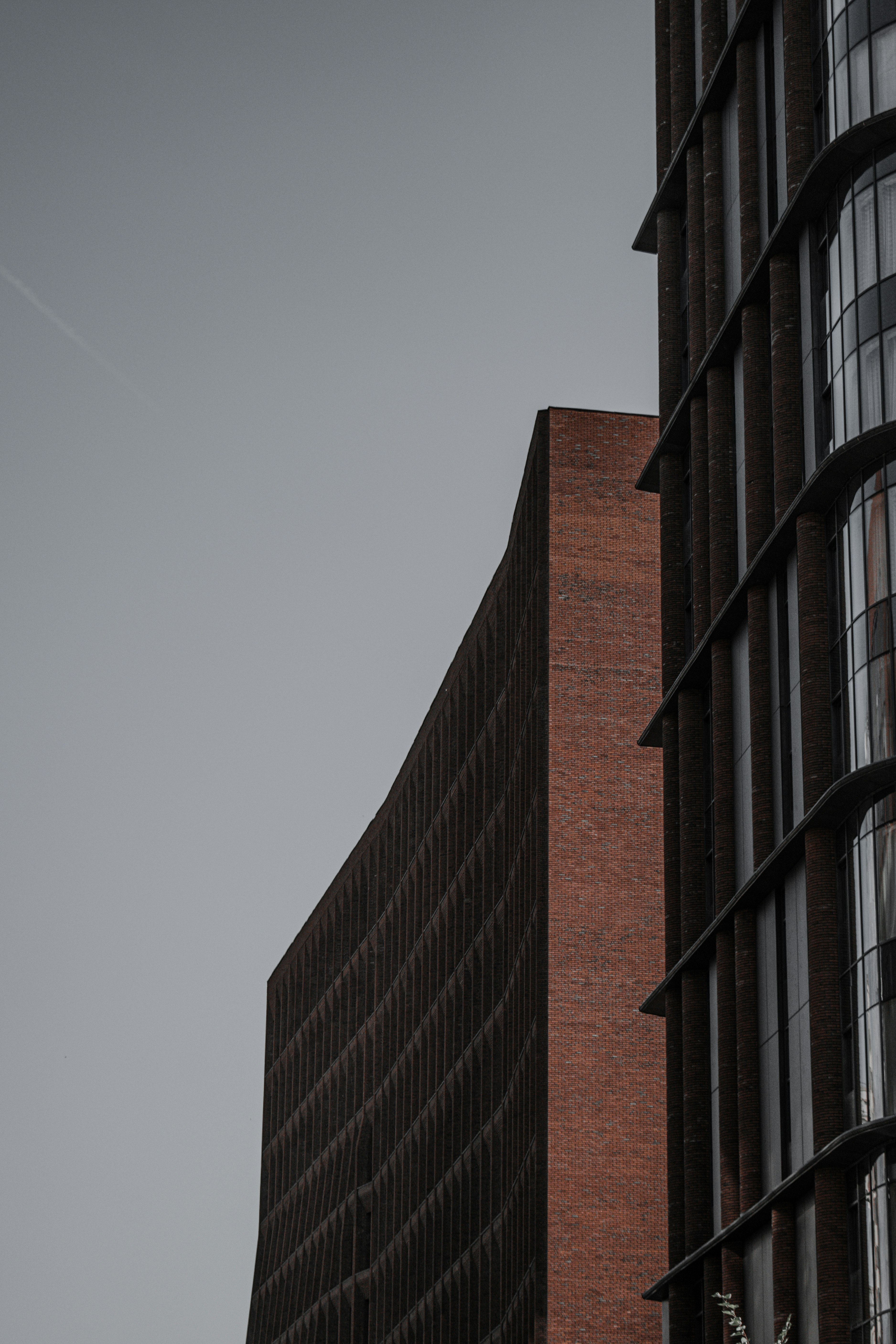 brown concrete building under white sky during daytime