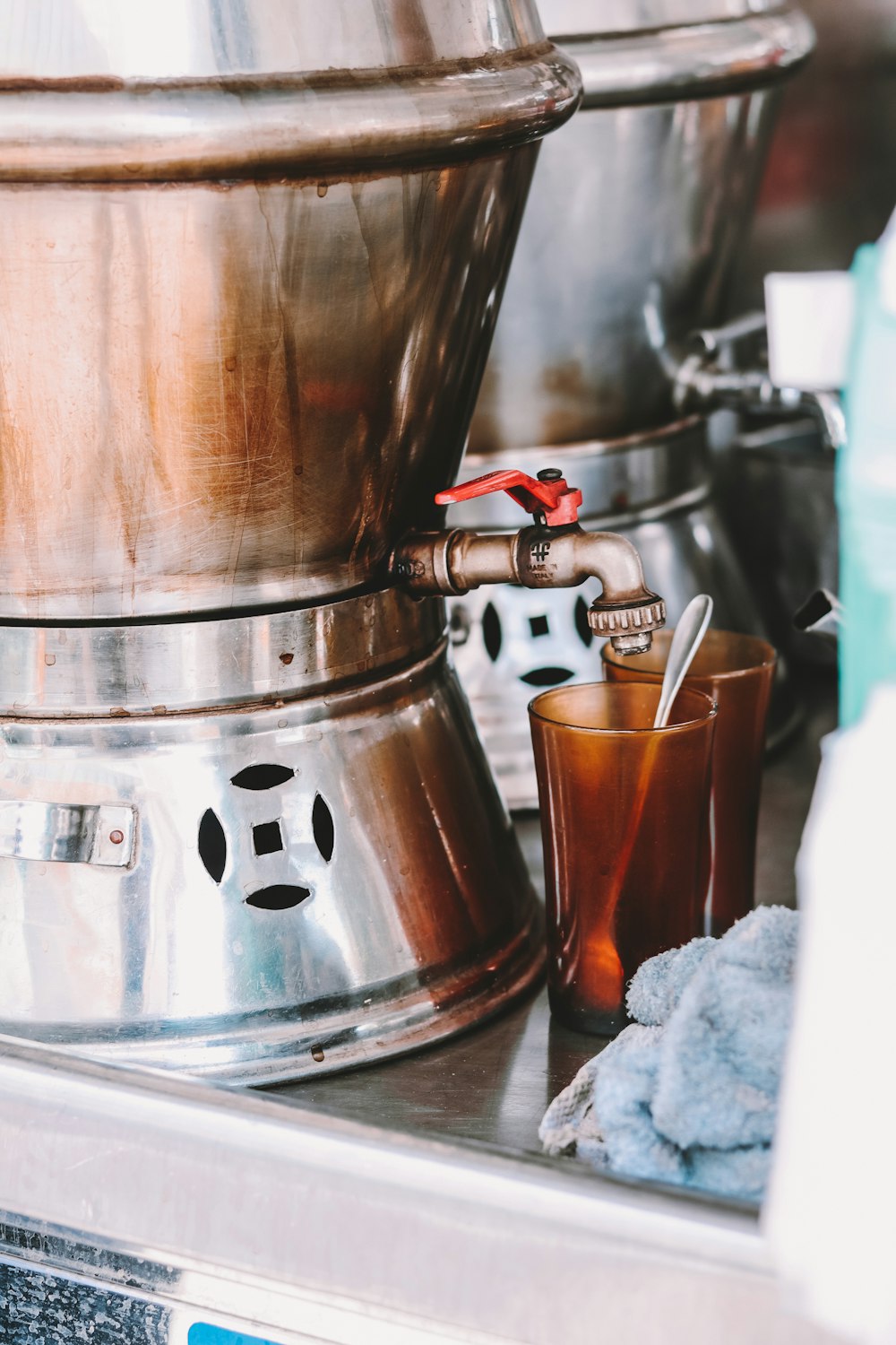 stainless steel coffee pot on gray stove